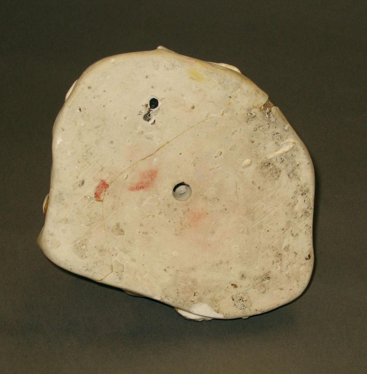 1970.1371 Porcelain figure [underside]
