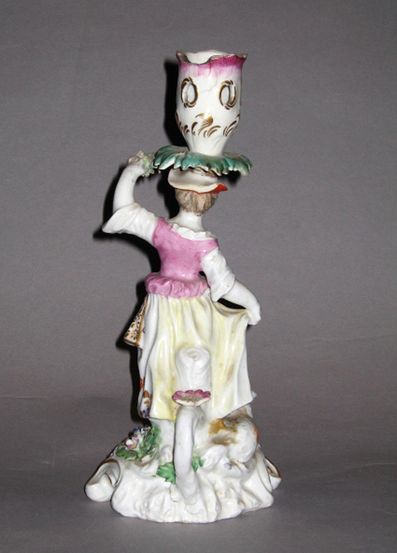 1970.1372.002 Porcelain candlestick figure of a shepherdess (reverse)