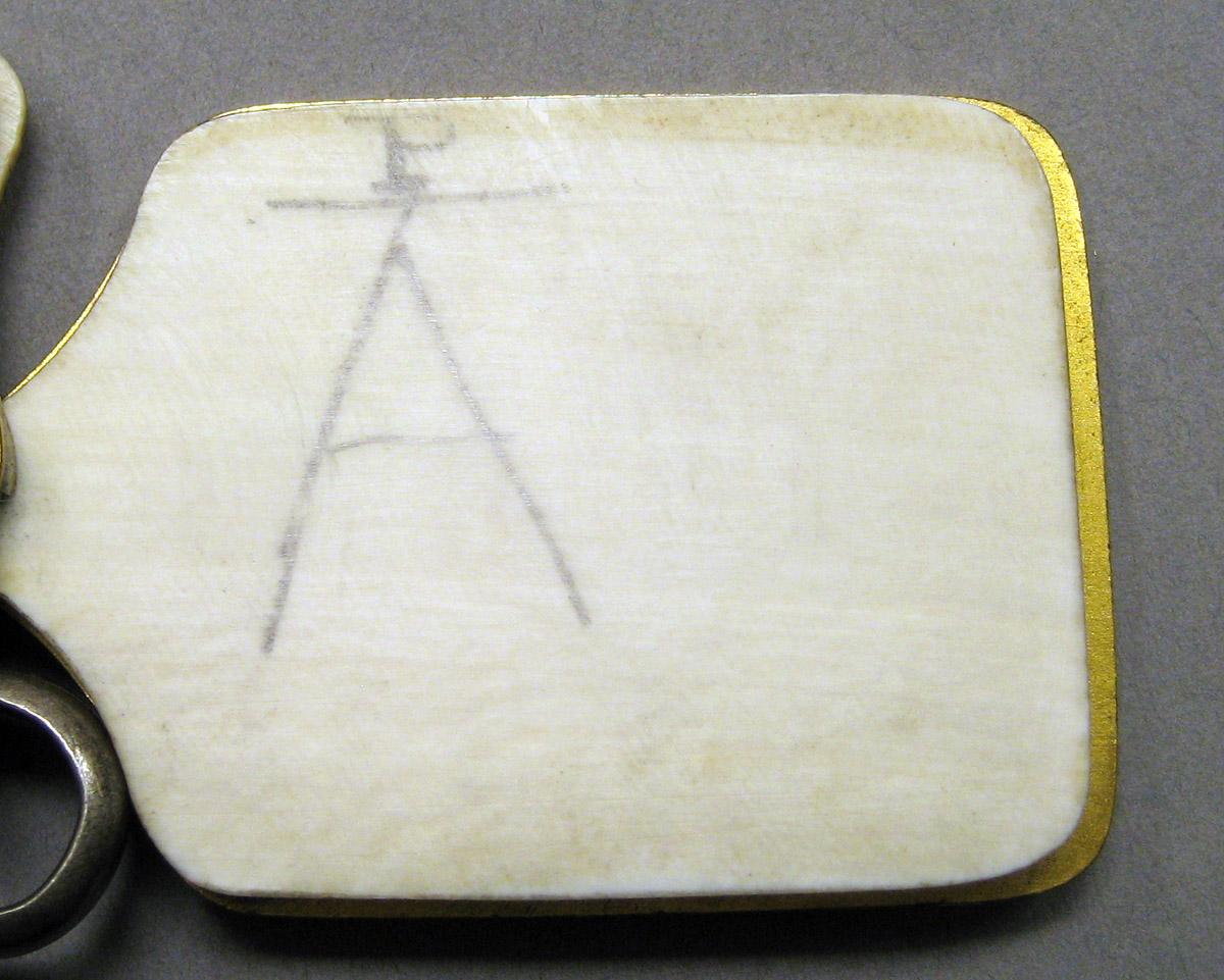 1970.1441 Silver Tool (for sewing) page 1 underside