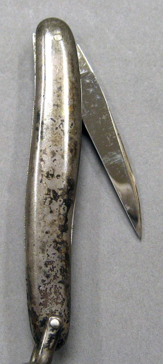 1970.1441 Silver Tool (for sewing) detail 3 open