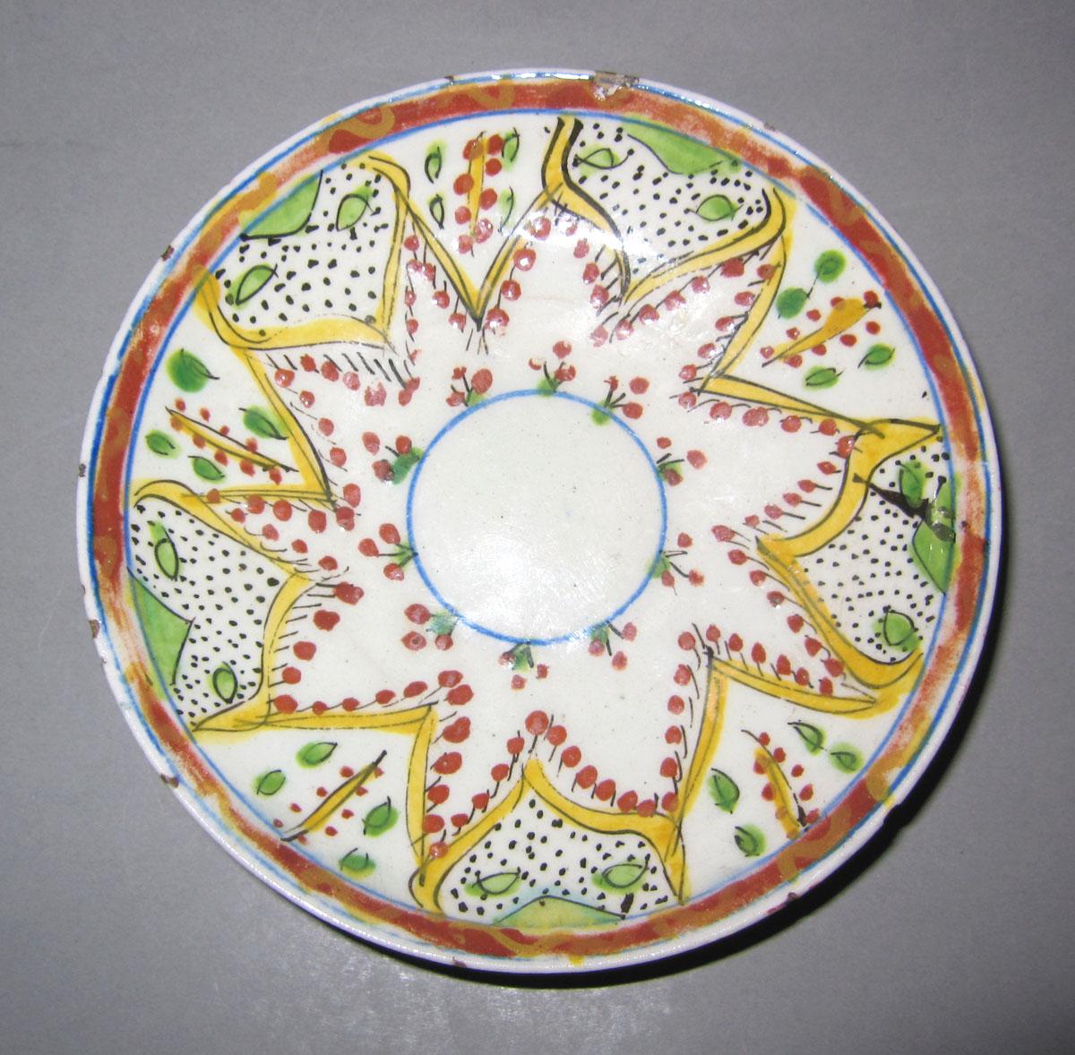 1971.0051 B Earthenware saucer