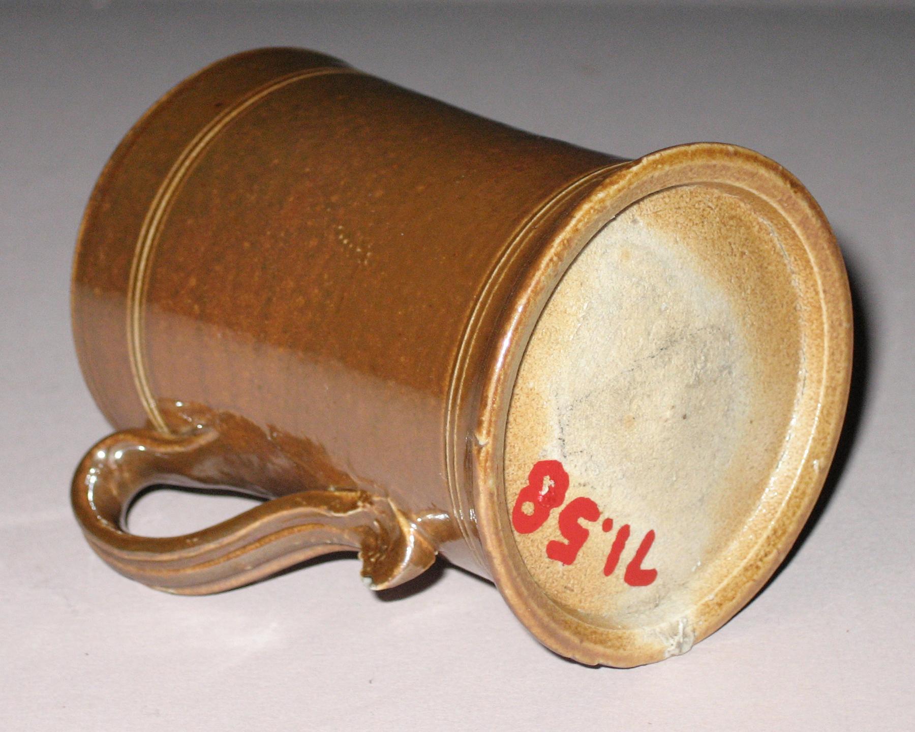 1971.0058 Salt-glazed stoneware mug (bottom)