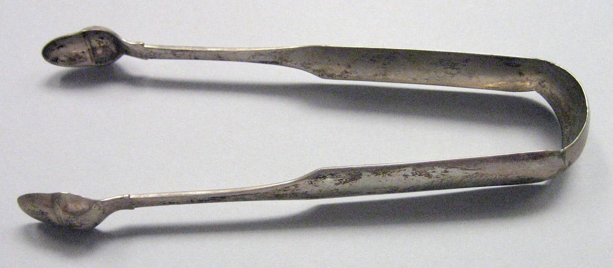 1971.0075 Silver Tongs view 1