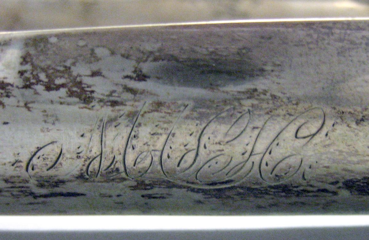1971.0075 Silver Tongs engraving