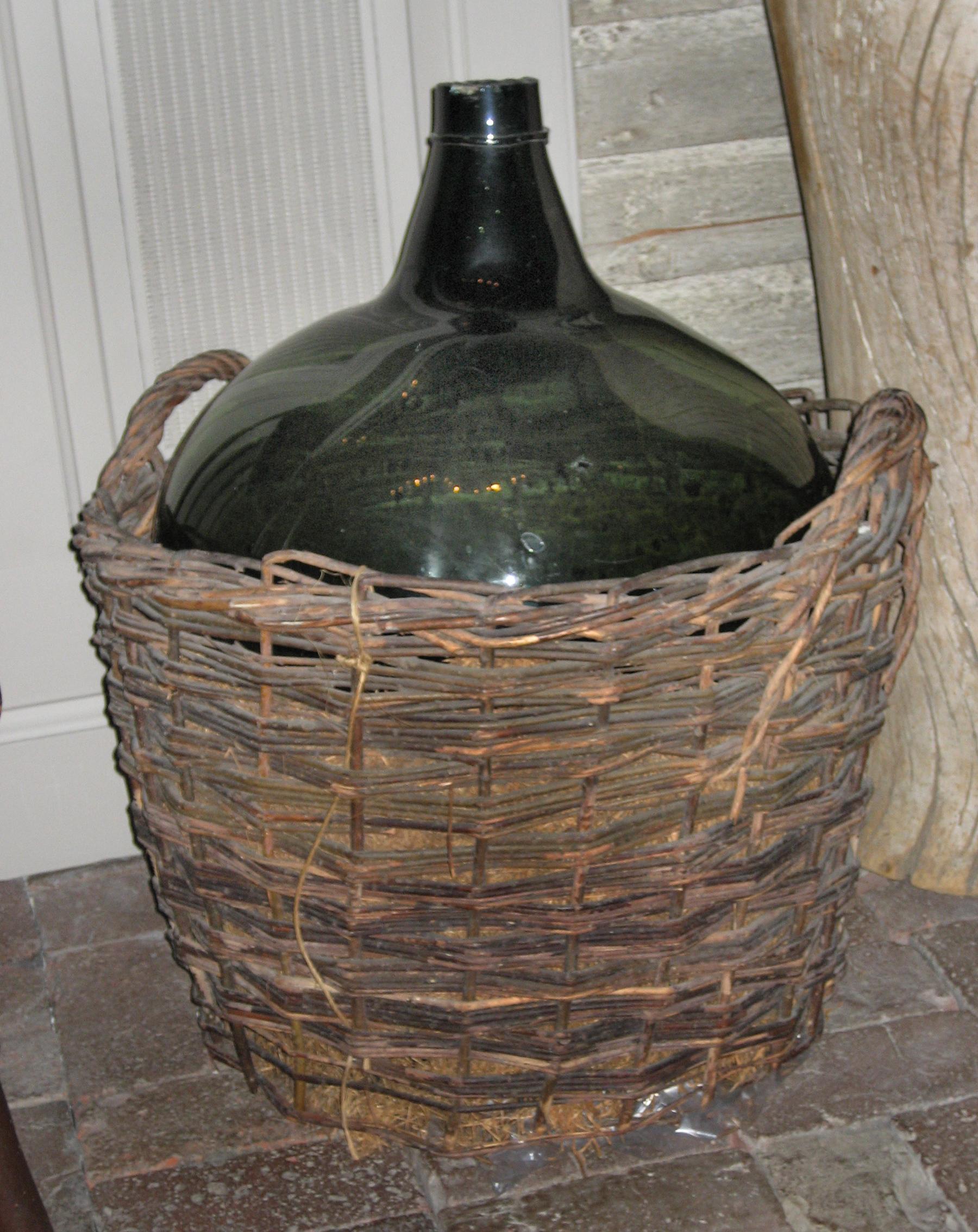 1971.0198 A, B Demijohn (bottle) in basket