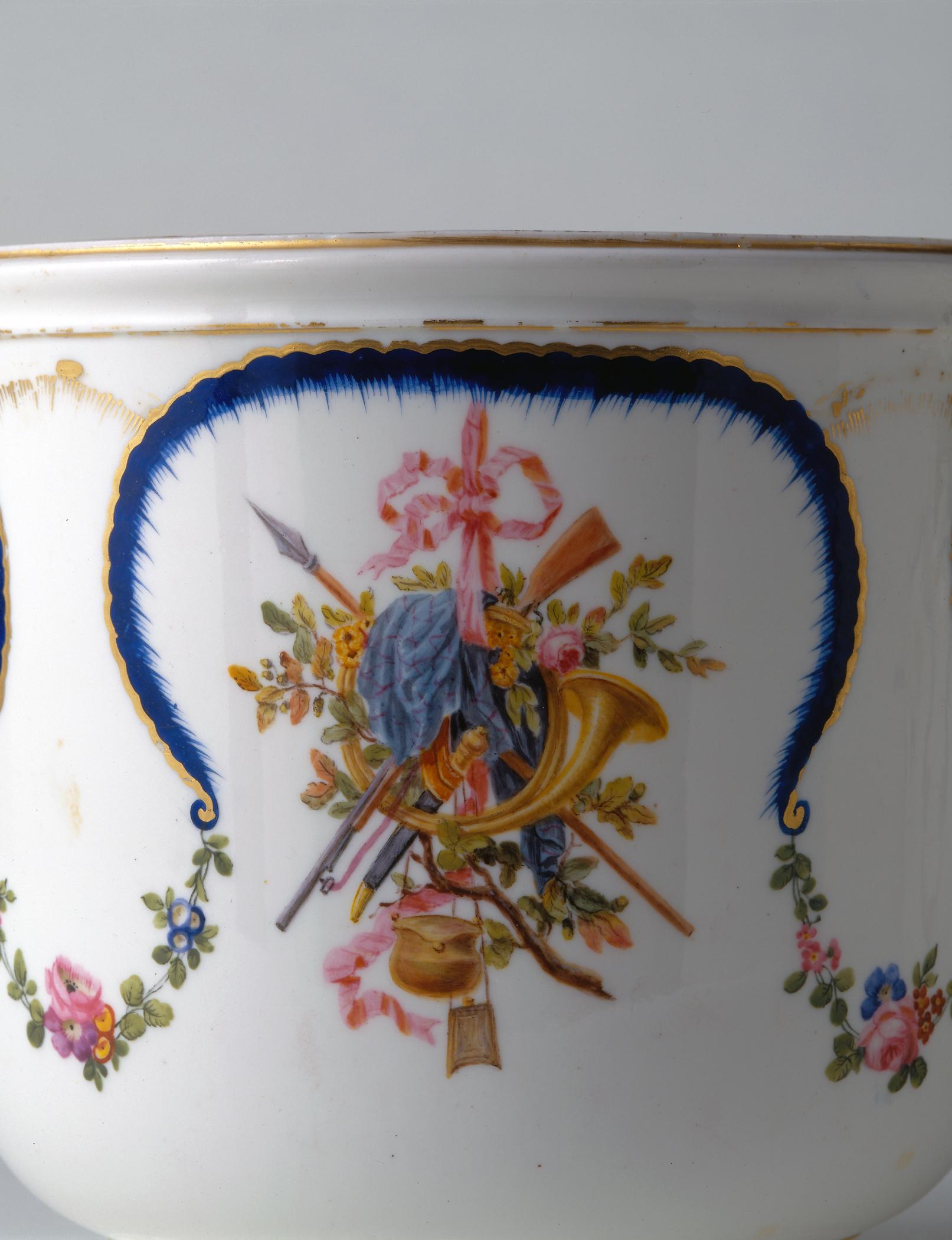 1971.0239 Sevres porcelain jardiniere (Detail, cluster of trophies)