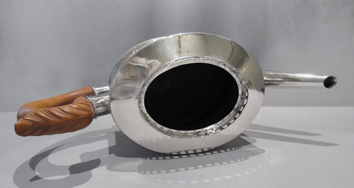 1957.0823 A Teapot, upper surface and interior