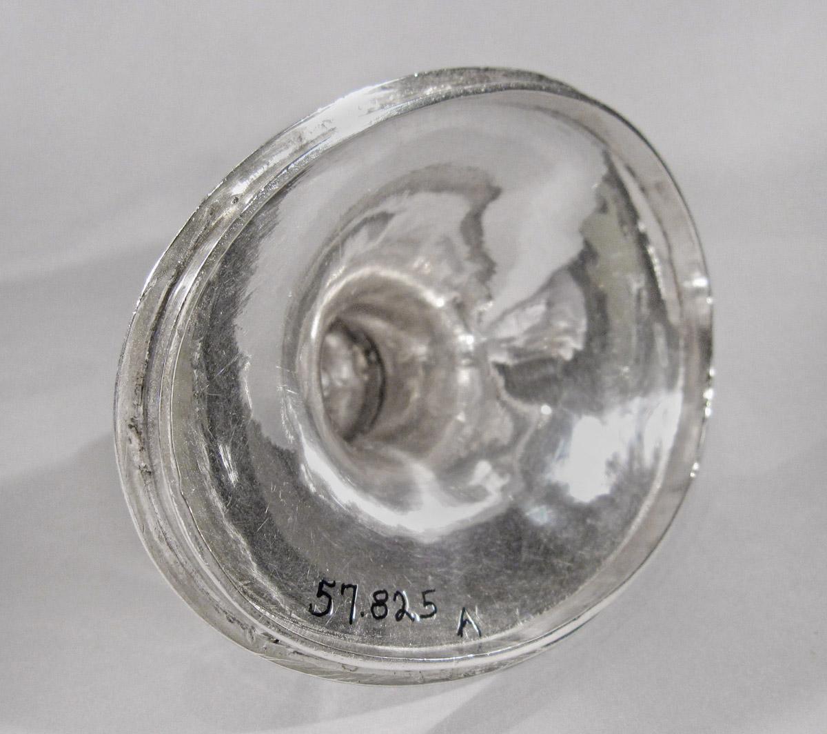 1957.0825 A Coffee pot lid, underside