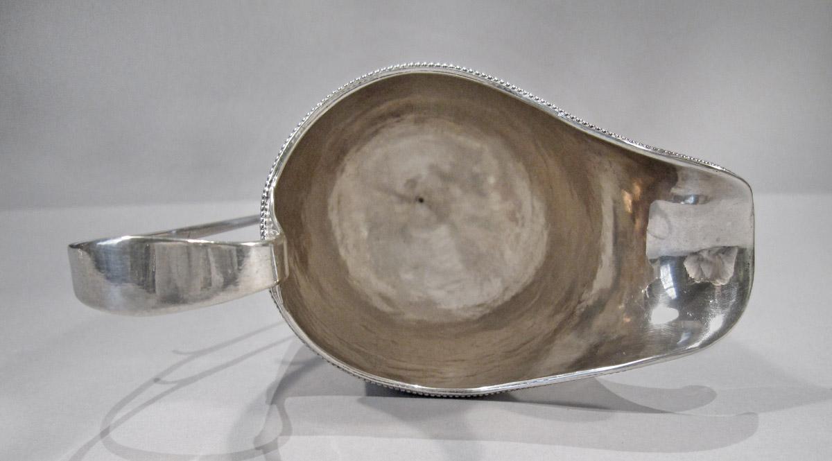 1957.0826 Cream pot, interior