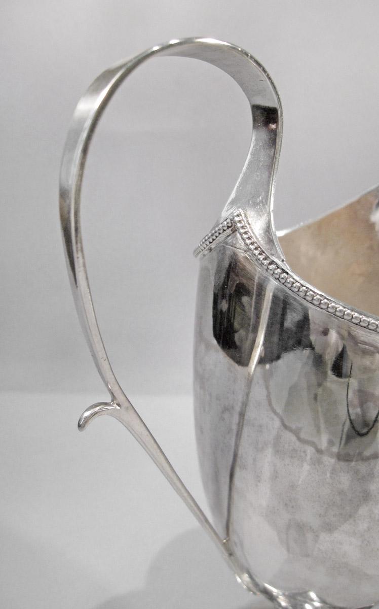 1957.0826 Cream pot, handle