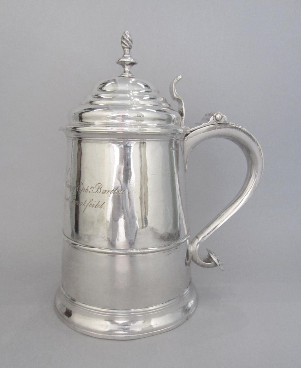 1957.0859.004 Tankard, side 1