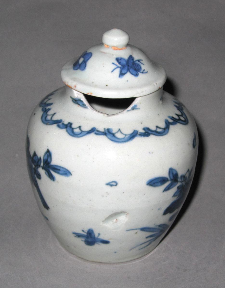 1972.0085 A,B Porcelain jar and cover face two