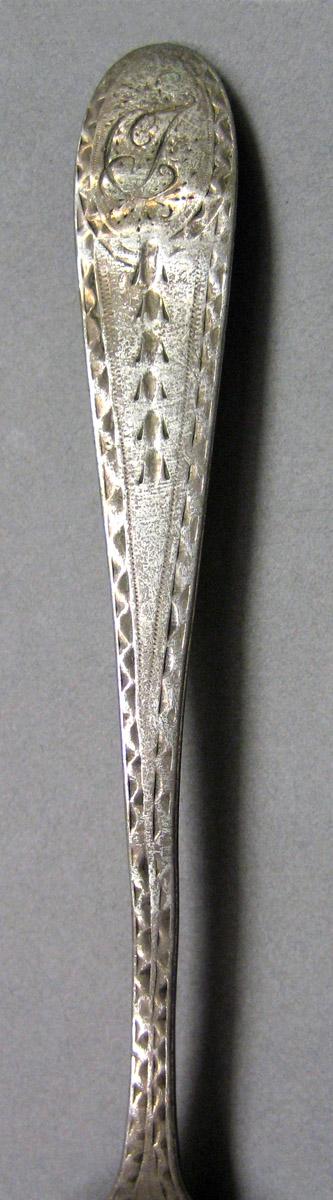 1972.0095 Silver Spoon handle decoration