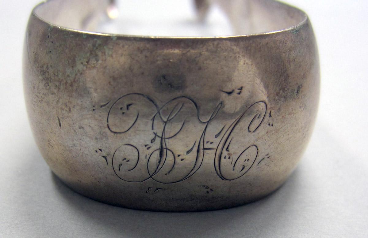 1972.0101 Silver Tongs engraving