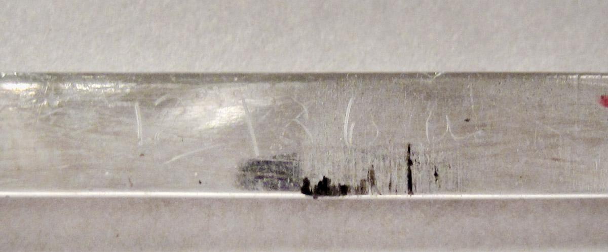 1972.0136 A Spectacles, inscription