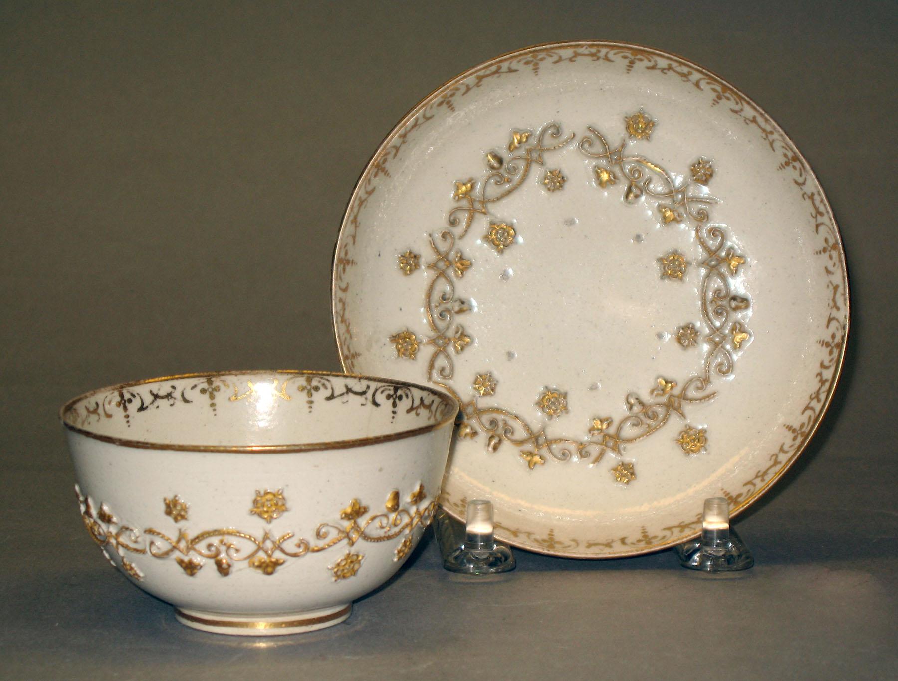 1972.0164 A, B Salt-glazed stoneware teabowl and saucer