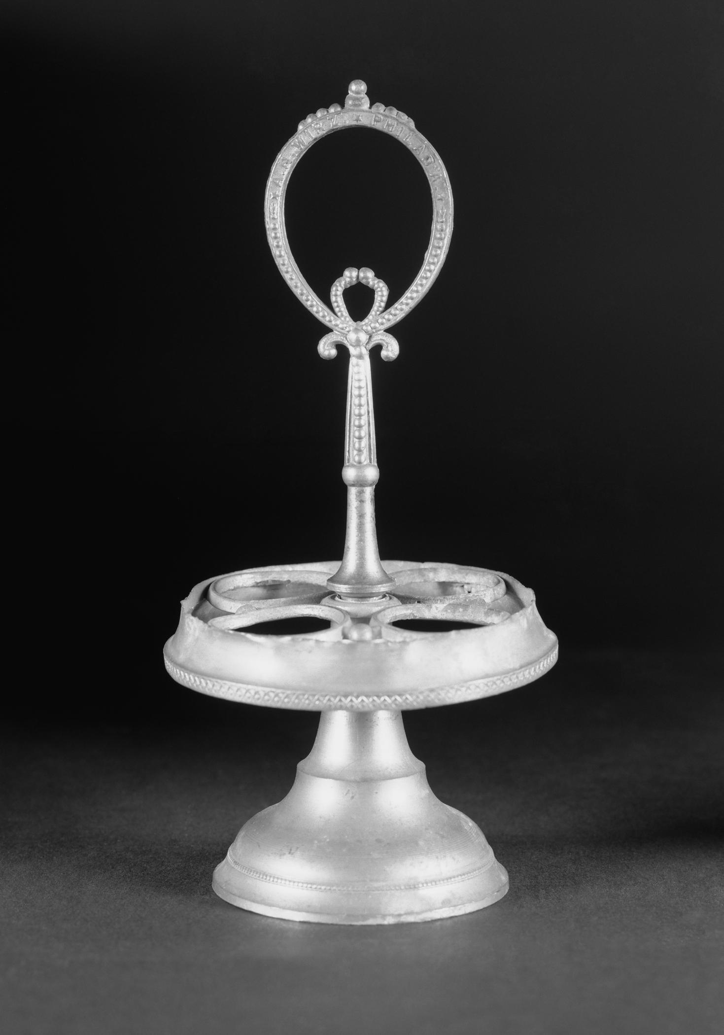 1972.0251 Miniature pewter castor stand