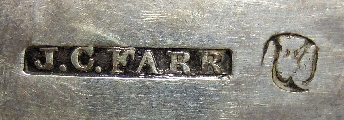 1972.0298 Teaspoon mark
