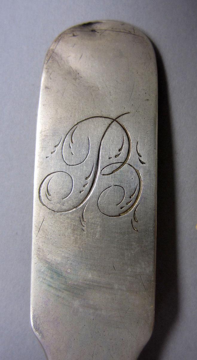1972.0299 Teaspoon engraving