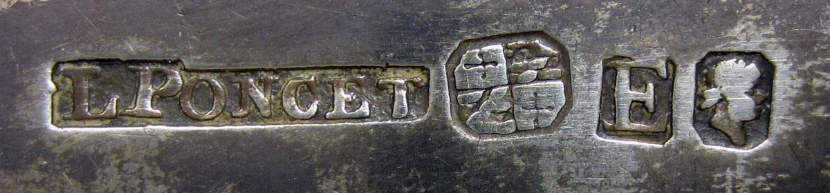 1972.0369 Teaspoon mark