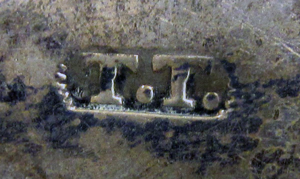 1972.0371 Teaspoon mark