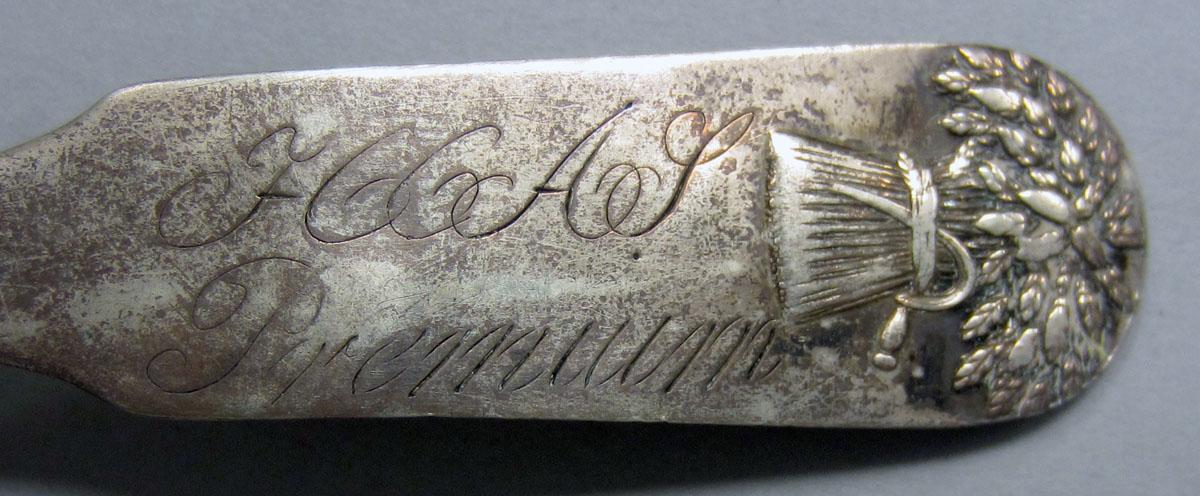 1972.0393 Teaspoon engraving