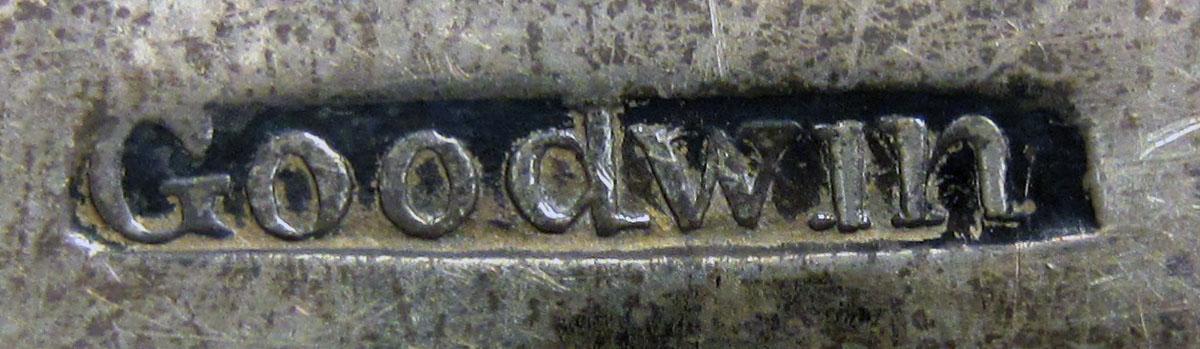 1972.0393 Teaspoon mark