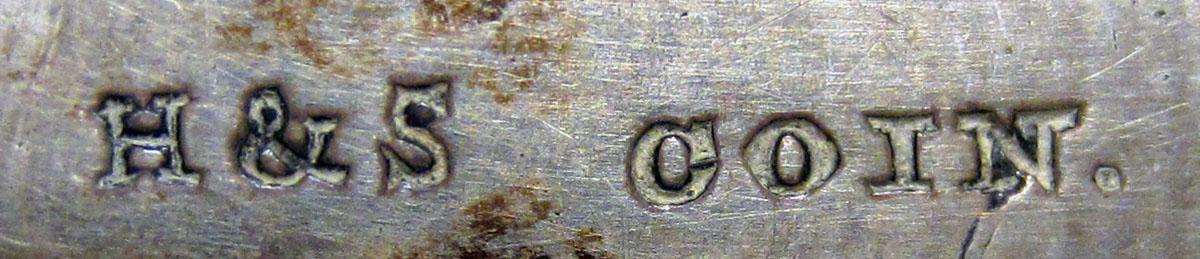 1972.0394 Teaspoon mark