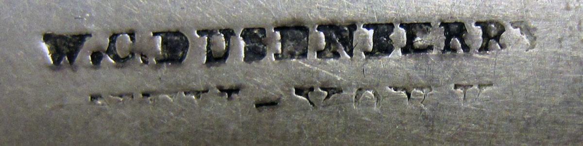 1972.0395 Teaspoon mark
