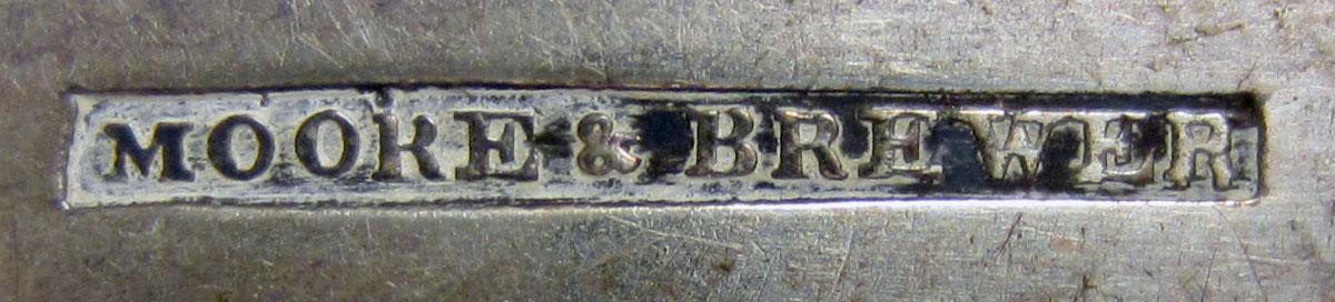 1972.0399 Teaspoon mark