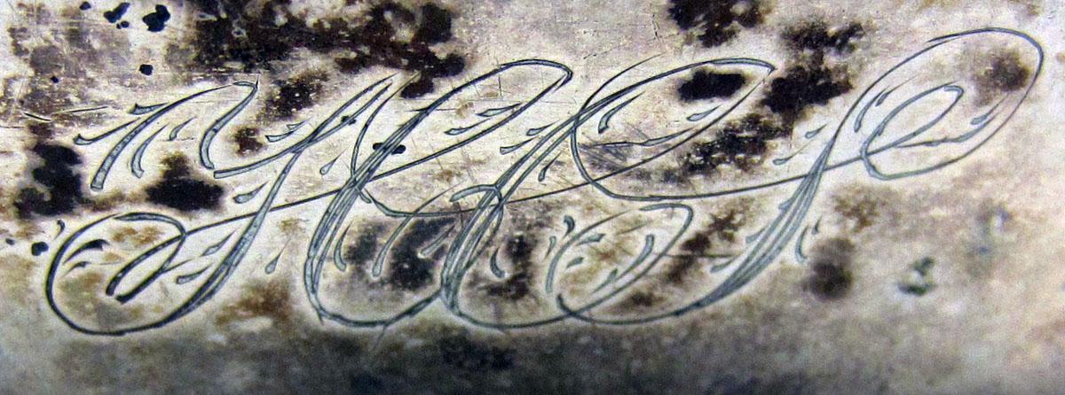 1973.0023 Sugar tongs engraving