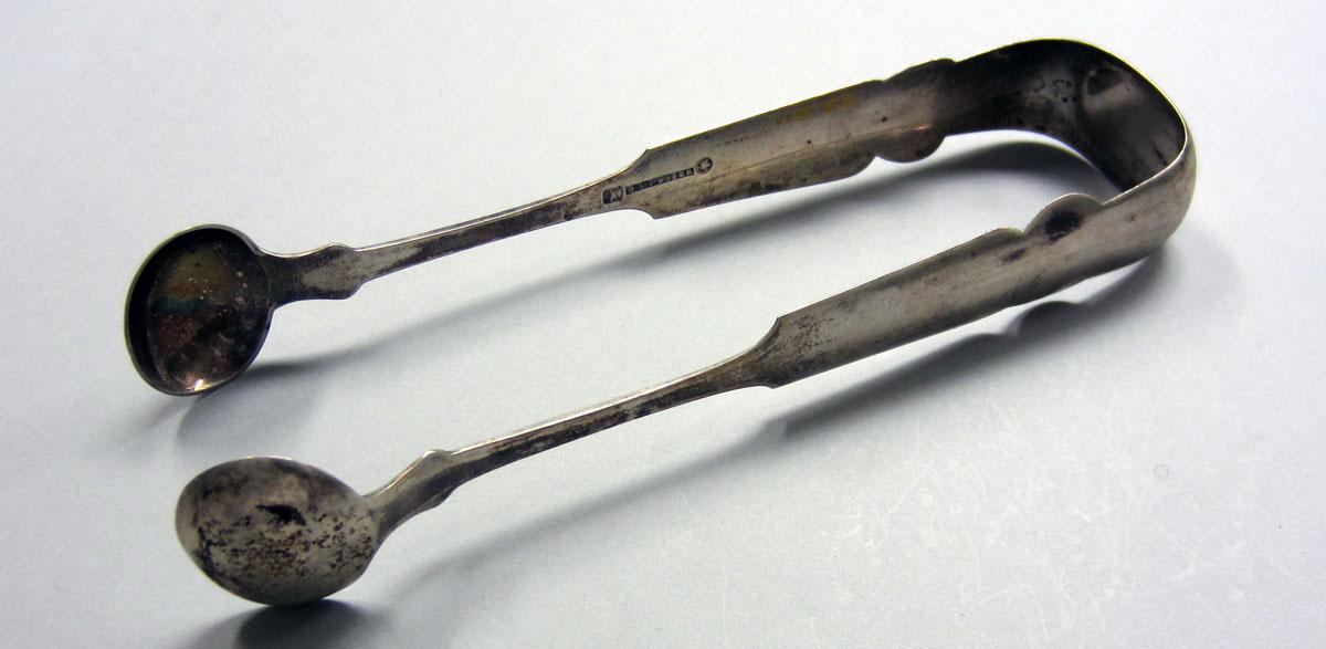 1973.0024 Sugar tongs view 1