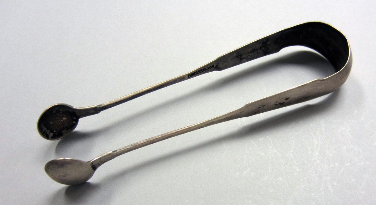 1973.0041 Sugar tongs view 1