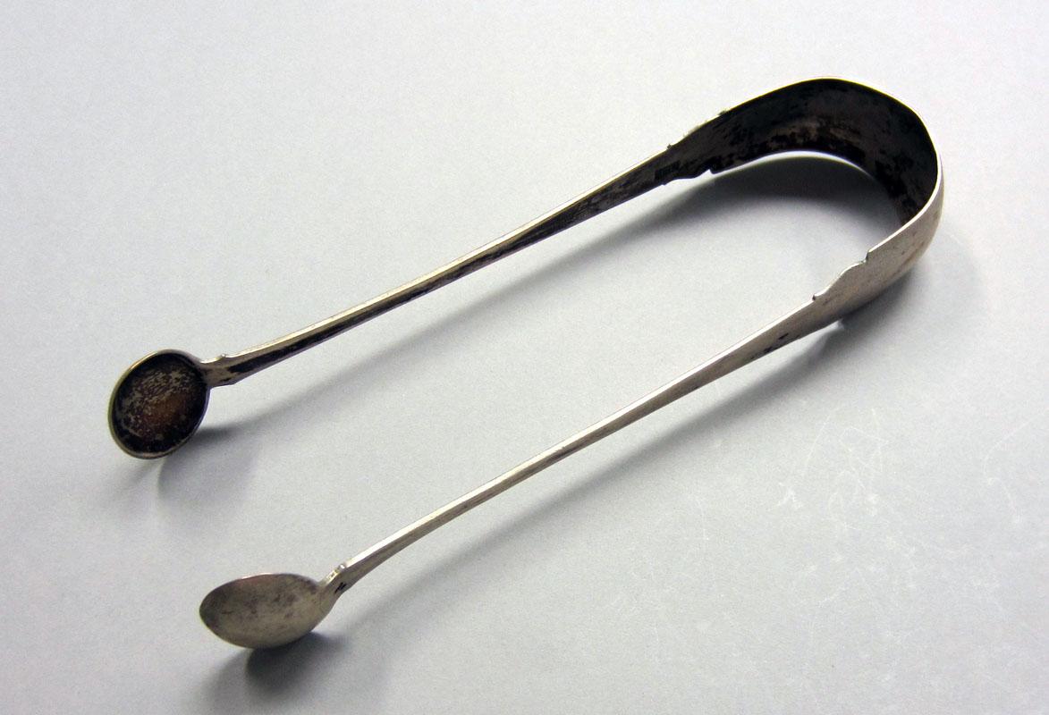 1973.0042 Sugar tongs view 1