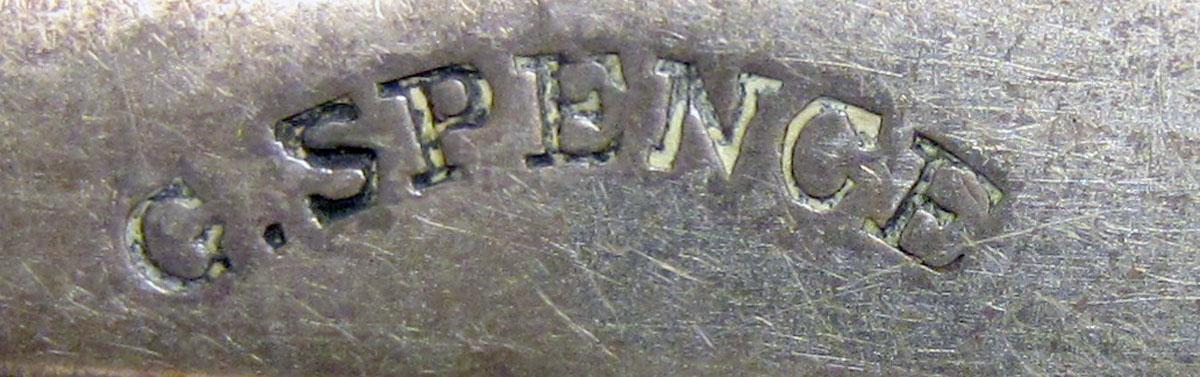 1973.0063 Teaspoon mark