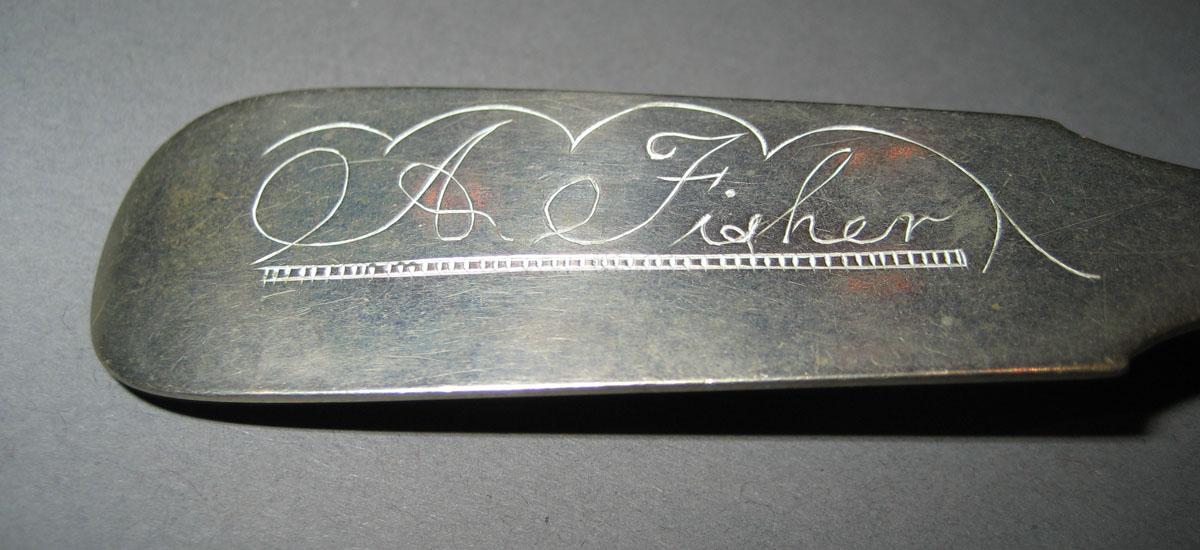 1973.0137 Spoon (inscription)