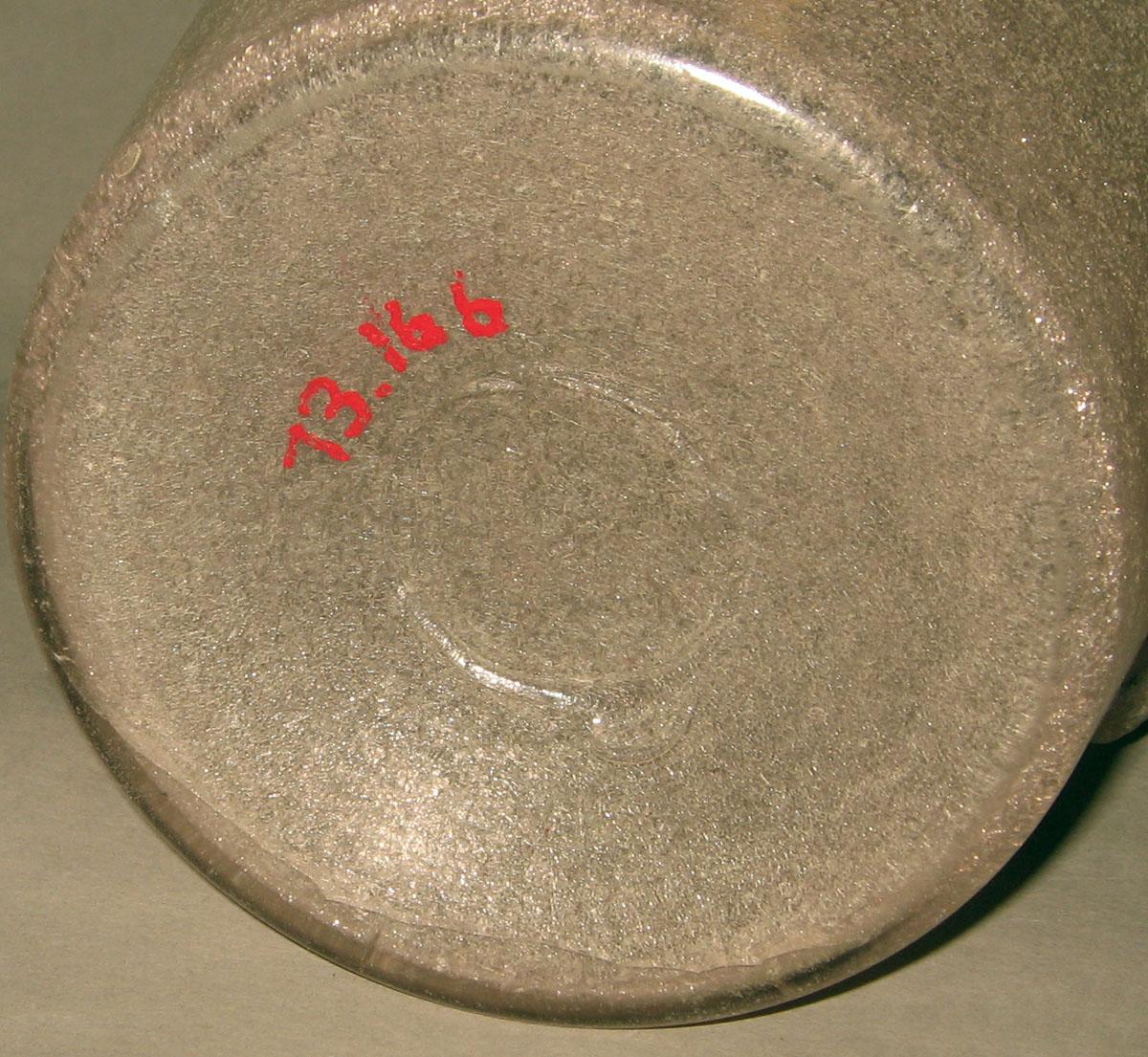 1973.0166 Glass jug (underside)