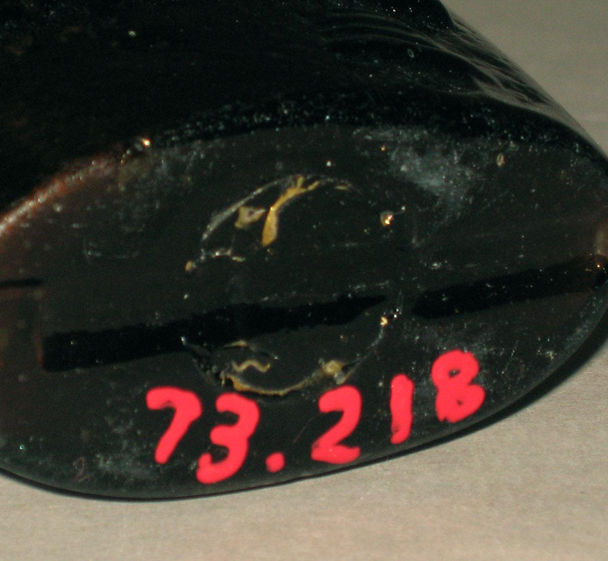 1973.0218 Glass flask (underside)