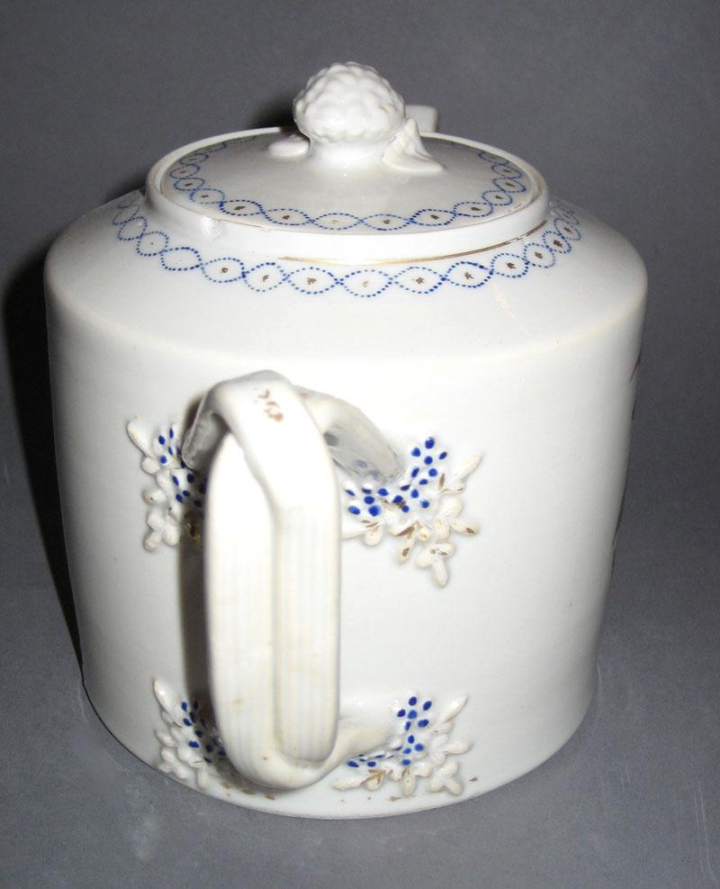 1973.0240 A, B Teapot handle view