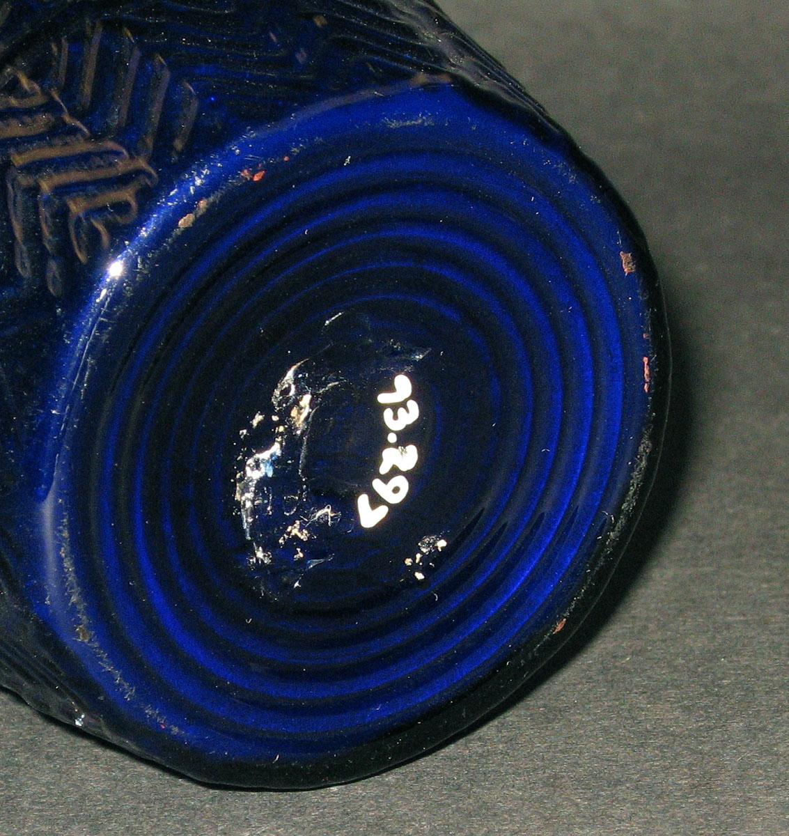 1973.0297 Glass jug (underside)