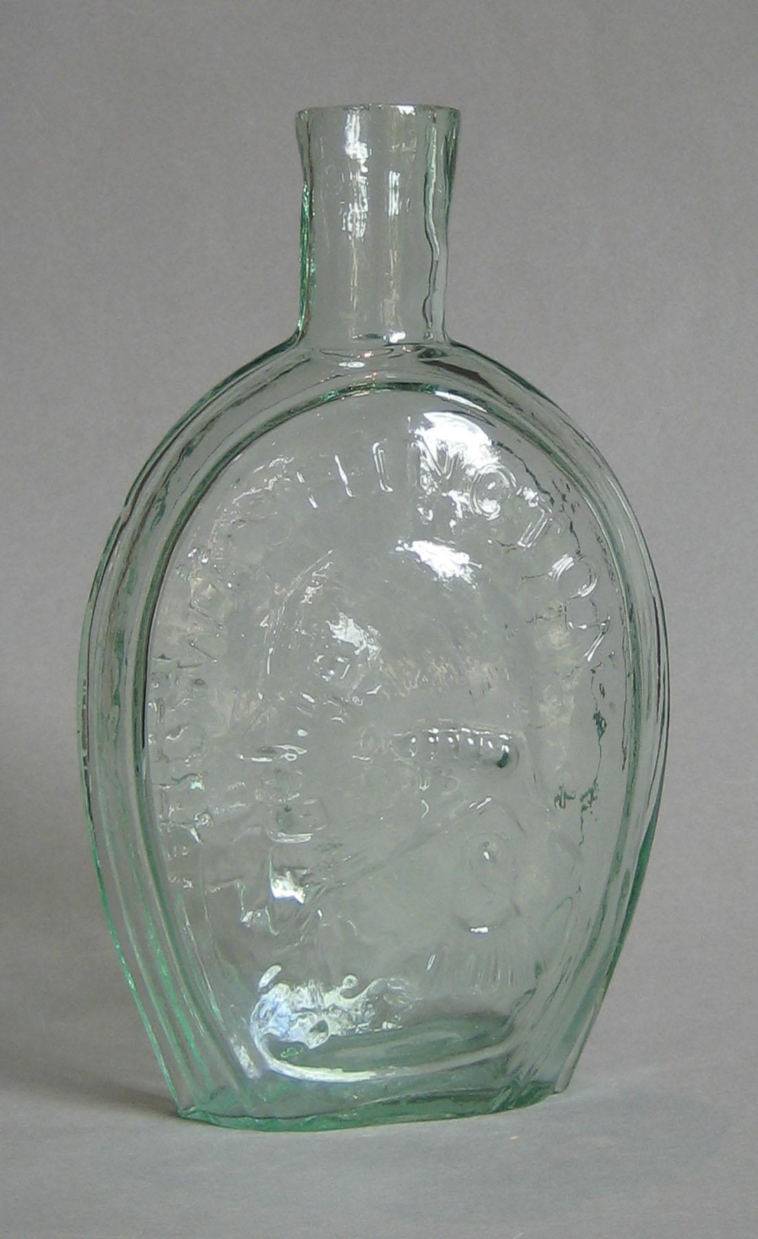 1973.0400.003  (side 2) Glass Flask