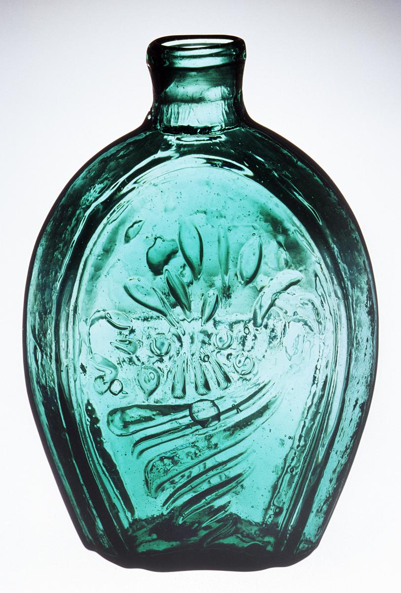 1973.0419.001 Glass flask (op. side)