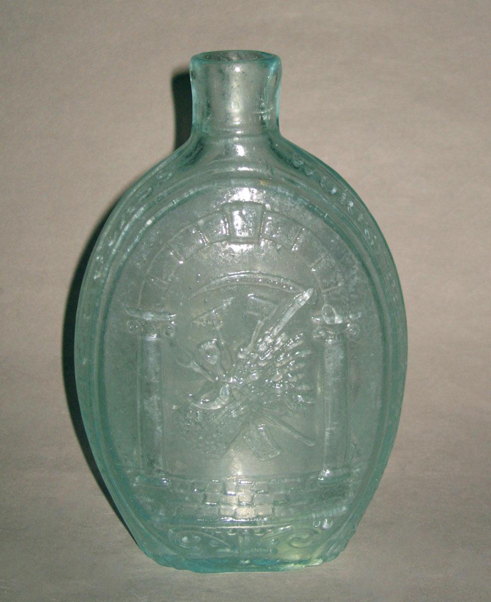 1973.0420.003 Glass flask (op. side)