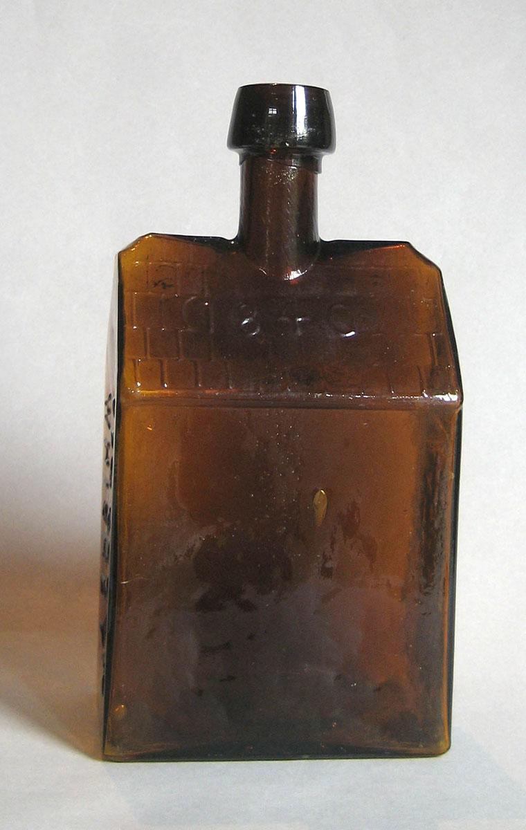 1973.0424 (side 3) Glass Bottle