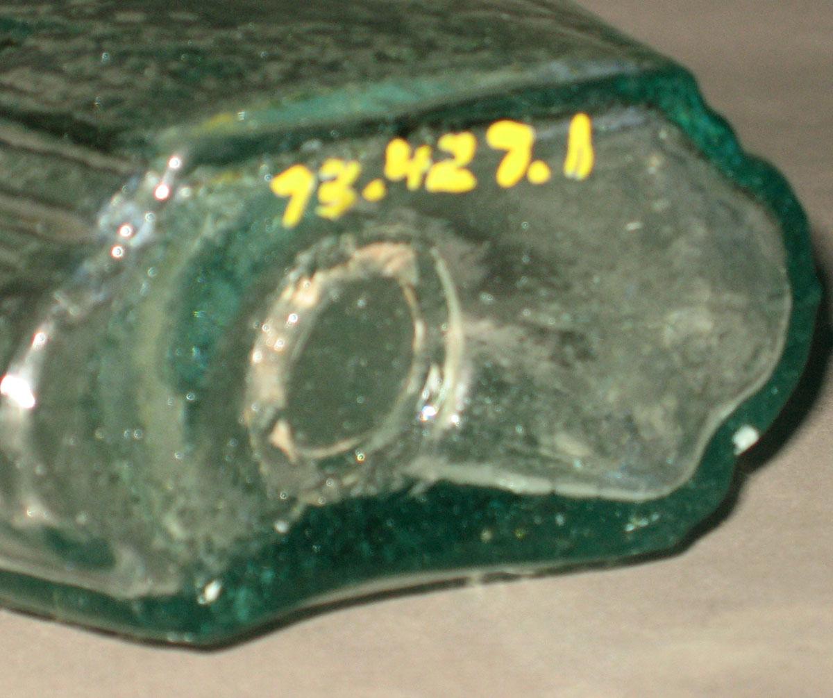 1973.0427.001 Glass flask (underside)