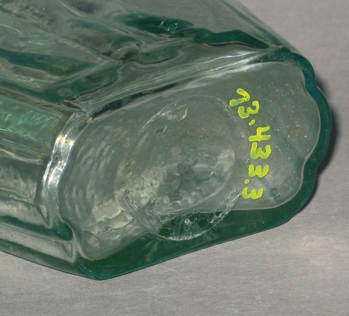 1973.0433.003 Glass pictorial flask (underside)