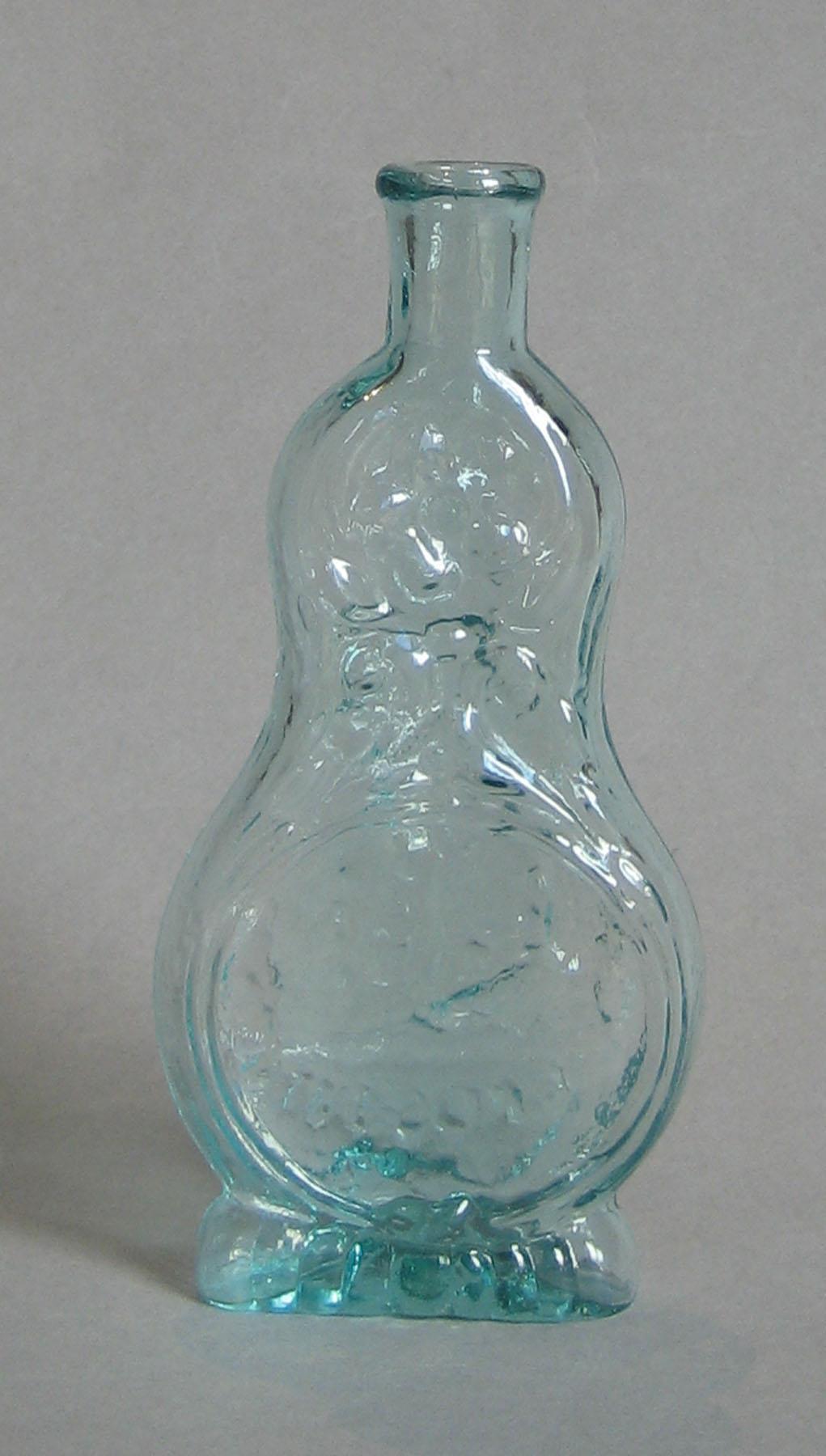 1973.0434 (side 2) Glass Bottle