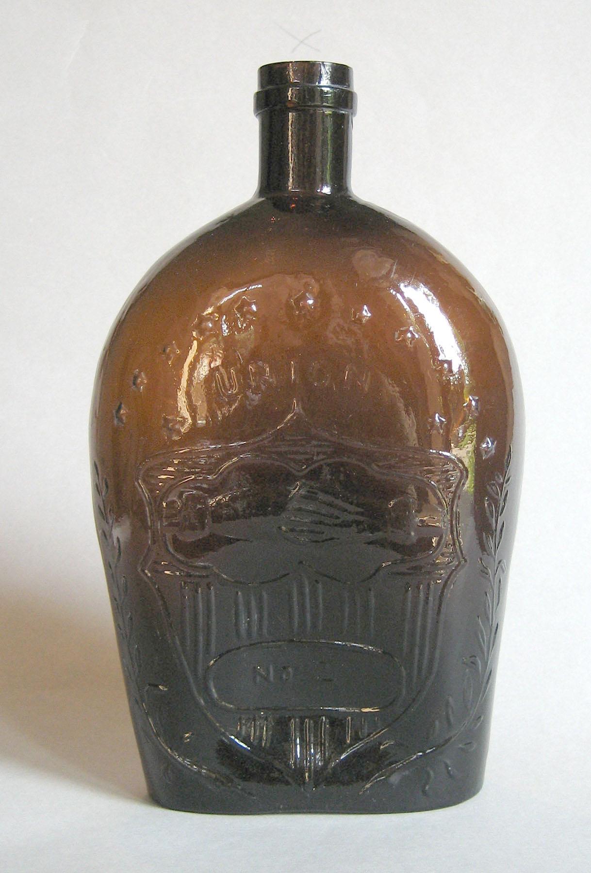 1973.0436.001 Glass flask side 2