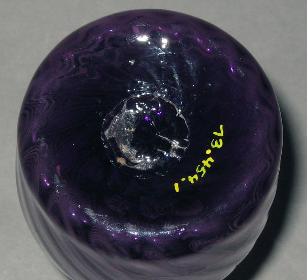 1973.0454.001 Amethyst glass cruet bottle (underside)