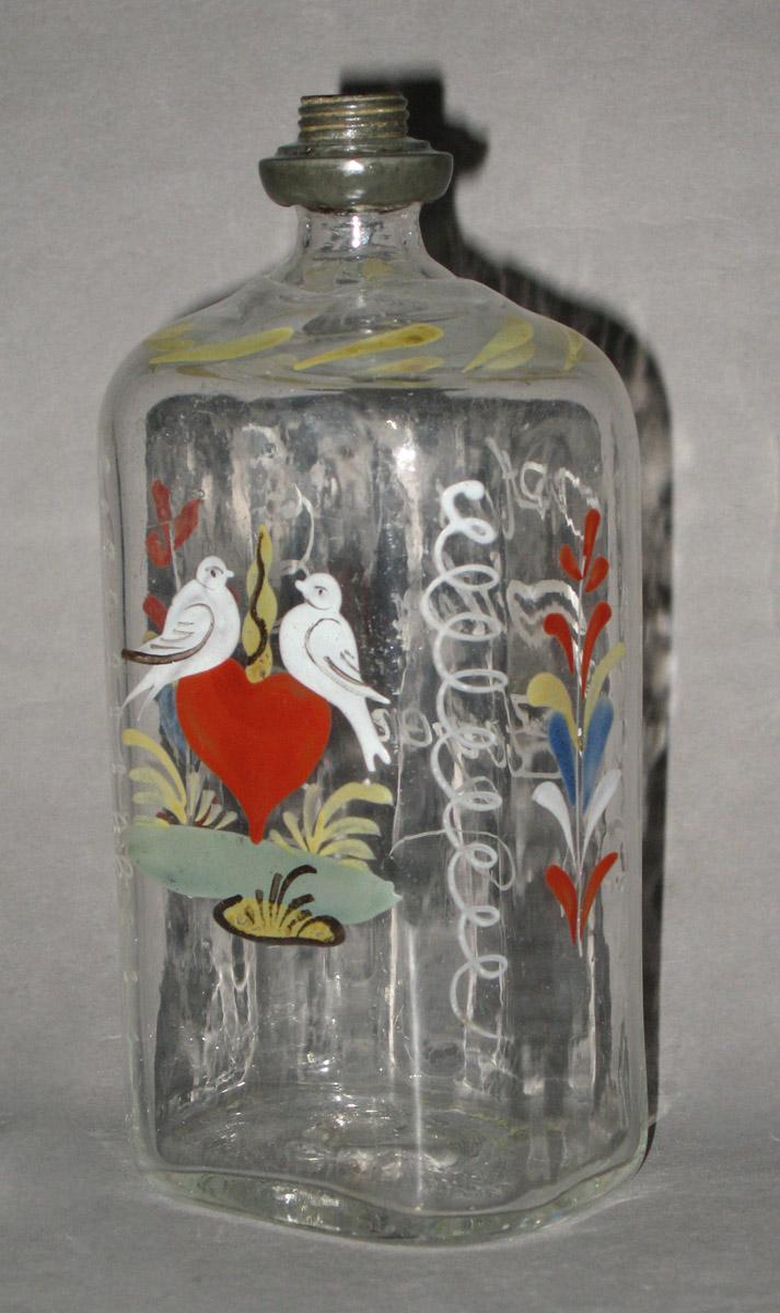 1973.0476.001 A Glass bottle (side 2)